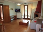 ferienwohnung-torri-del-benaco-mit-pool-Wohnzimmer-0001
